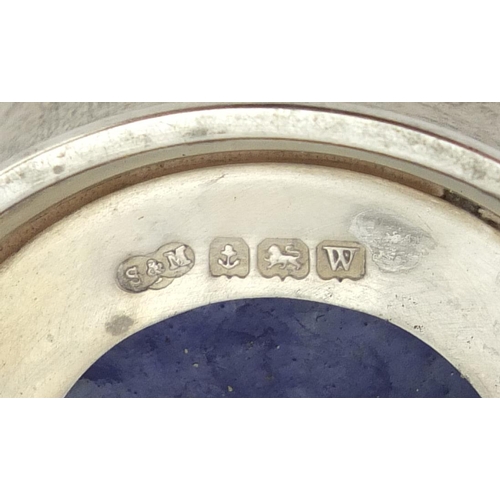 2381 - Silver mustard with hinged lid and open salt, both with blue glass liners, Birmingham hallmarks, the... 