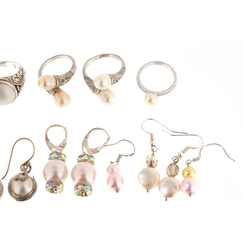 2440 - Silver and pearl jewellery comprising five rings and five pairs of earrings, approximate weight 48.6... 