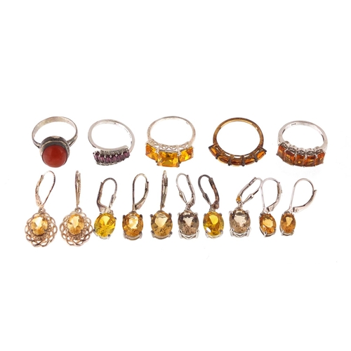 2429 - Five silver semi precious stone rings and five pairs of silver semi precious stone earrings, approxi... 