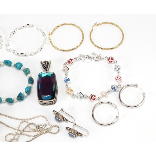 2453 - Silver jewellery, some set with semi precious stones including hoop earrings, bracelets, pendants an... 