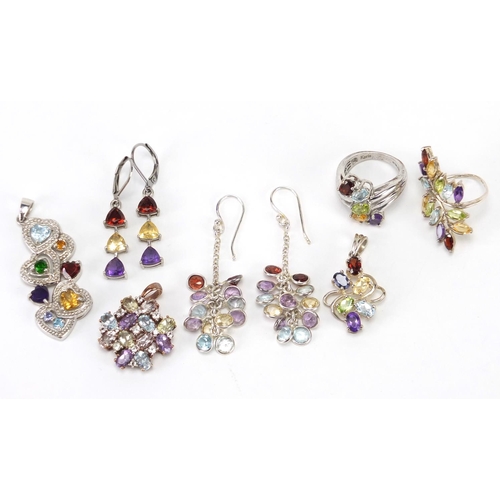 2457 - Silver semi precious stone jewellery comprising three pendants, two rings and two pairs of earrings,... 