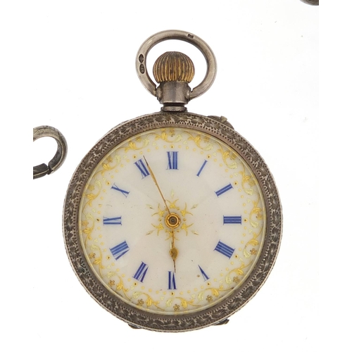 2447 - Ladies silver open face pocket watch and a silver Albert chain, the pocket watch 3.5cm in diameter, ... 