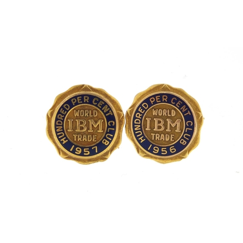 2448 - Pair of 10ct gold and enamel IBM hundred per cent club badges-1956 and 1957, each 1.5cm in diameter,... 