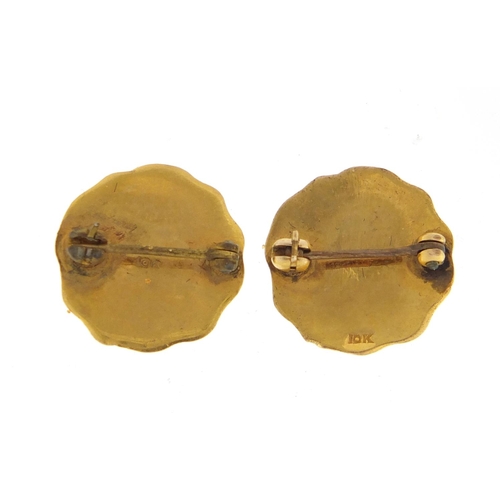 2448 - Pair of 10ct gold and enamel IBM hundred per cent club badges-1956 and 1957, each 1.5cm in diameter,... 