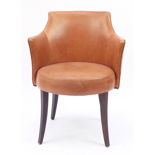 2043 - Contemporary Morgan tan leather chair on out swept tapering legs, 81cm high
