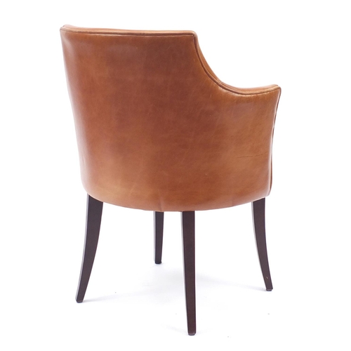 2043 - Contemporary Morgan tan leather chair on out swept tapering legs, 81cm high