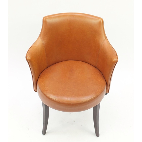 2042 - Contemporary Morgan tan leather chair on out swept tapering legs, 82cm high