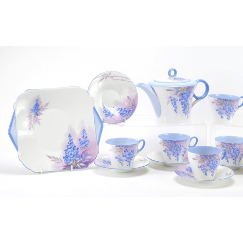 2124 - Art Deco six place tea service by Shelley, hand painted with flowers including teapot, milk jug and ... 