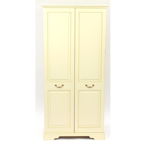 64A - Cream painted wood two door wardrobe, 195cm H x 95cm W x 65cm D