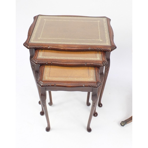 184 - Reproduction circular mahogany drum table with leather top and nest of three mahogany tables, the dr... 