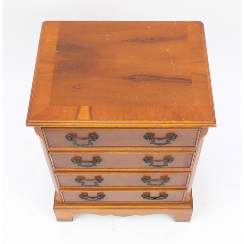 178 - Yew four drawer chest of small proportions on bracket feet, 63cm H x 45cm W x 33cm D