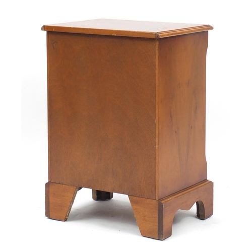 178 - Yew four drawer chest of small proportions on bracket feet, 63cm H x 45cm W x 33cm D