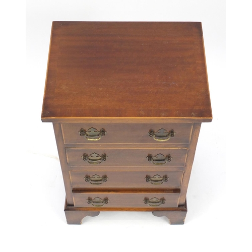 88 - Mahogany four drawer chest of small proportions on bracket feet, 61cm H x 38cm W x 30cm D