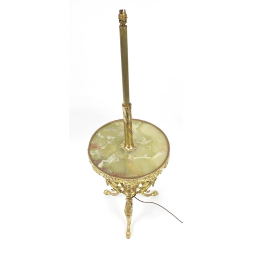 182A - Ornate brass standard lamp with onyx drinks tray, grotesques heads and hoof feet, 145cm high