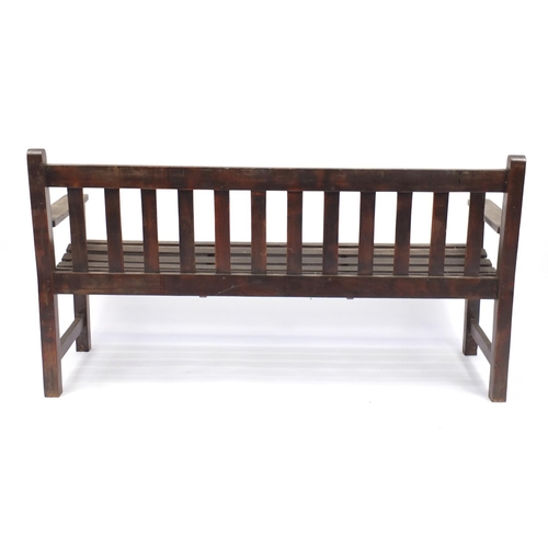 70 - Stained wooden slated garden bench, 158cm wide
