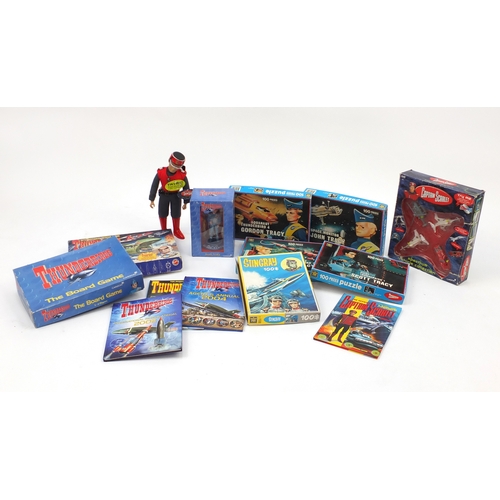 538 - Captain Scarlett and Thunderbird toys including jigsaw puzzles and action figure