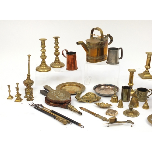 518 - Metalwares including Victorian and later brass candle sticks, fire bellows and brass watering can
