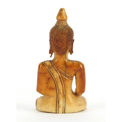 362 - ** DESCRIPTION AMENDED 8/7 ** Antique ivory carving of seated Buddha possibly Tibetan, 8cm high