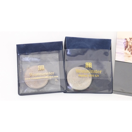 596 - Five commemorative five pound coins and a D-Day stamp presentation pack