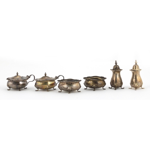 545 - Silver six piece cruet, by Walker & Hall Sheffield 1904, housed in a fitted tooled leather box, the ... 