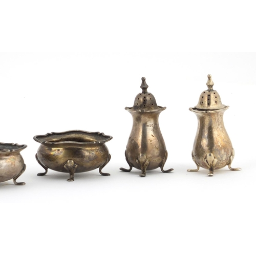 545 - Silver six piece cruet, by Walker & Hall Sheffield 1904, housed in a fitted tooled leather box, the ... 