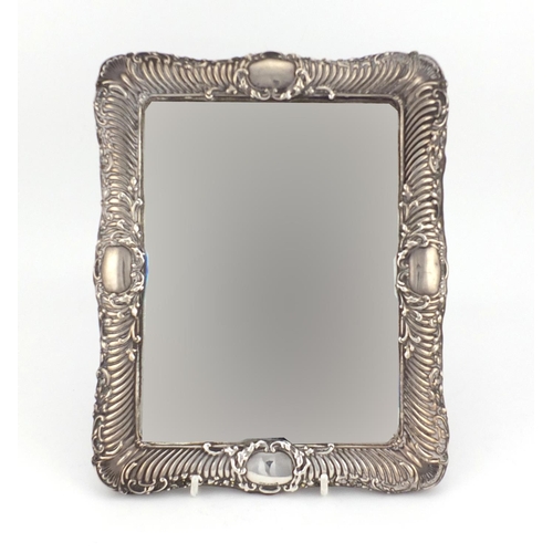 522 - Rectangular silver easel mirror embossed with leaves and shells, indistinct hallmarks, RD number 373... 