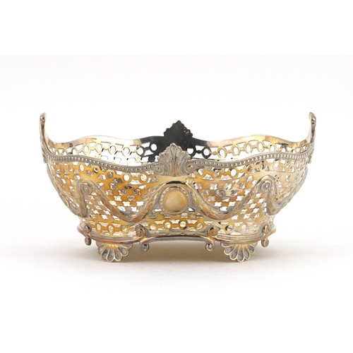 517 - Victorian silver basket, pierced and embossed with swags, by Charles Stuart Harris London 1895, 18.5... 