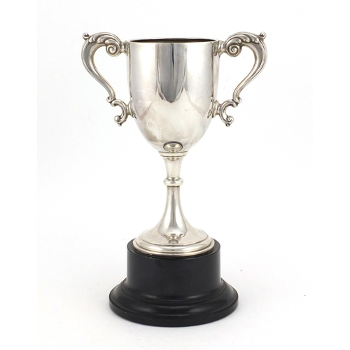 537 - Silver twin handled trophy on stand, by William Neale & Son Ltd Birmingham 1935, the trophy 17.5cm h... 