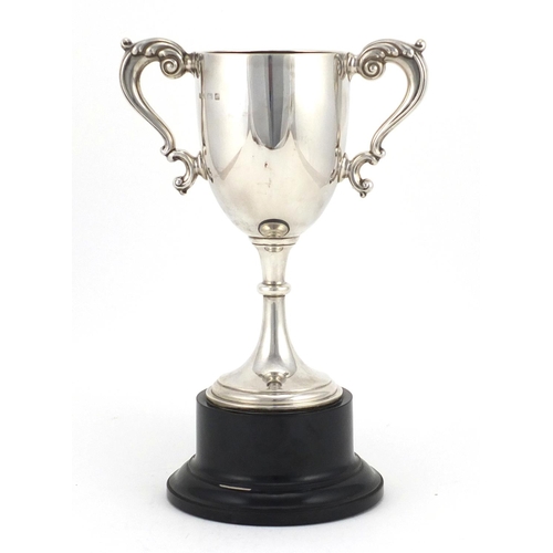 537 - Silver twin handled trophy on stand, by William Neale & Son Ltd Birmingham 1935, the trophy 17.5cm h... 