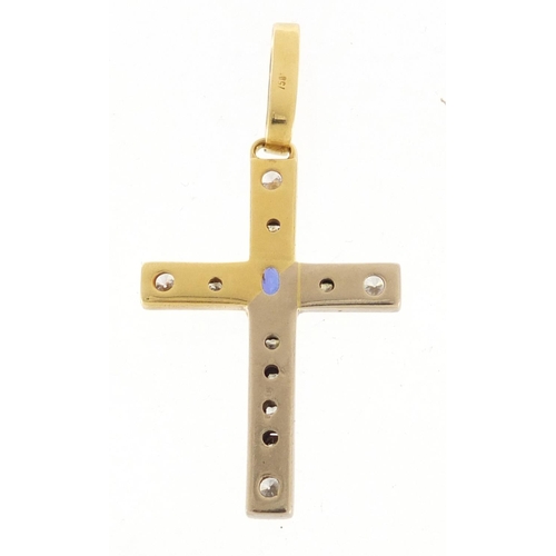 597 - 18ct gold diamond and blue stone cross pendant, 6cm in length, approximate weight 15.5g