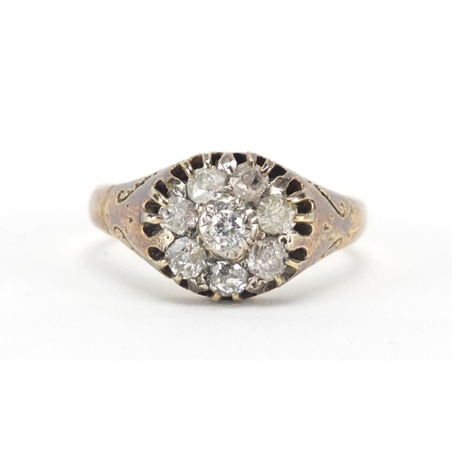 603 - 18ct gold diamond flower head ring, with engraved shoulders, size U, approximate weight 7.0g