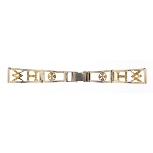 686 - Unmarked white and yellow metal diamond Masonic watch strap, 14cm in length, approximate weight 24.2... 