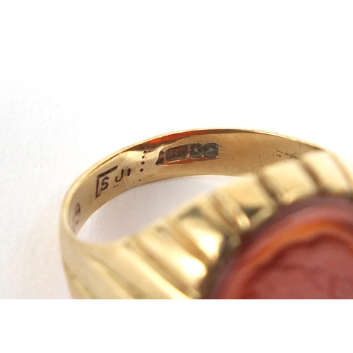 643 - 9ct gold intaglio seal signet ring, size O, approximate weight 6.4g