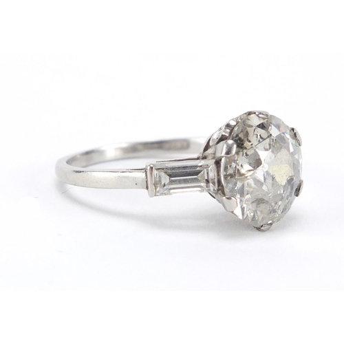 580 - Platinum diamond solitaire ring (approximately 3.00ct) with diamond shoulders , size O, approximate ... 