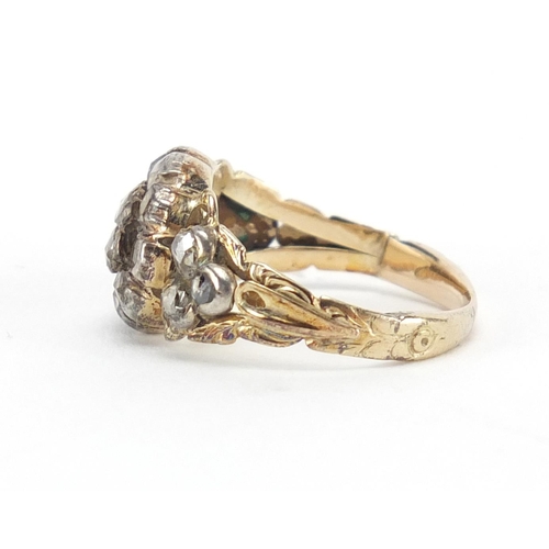 609 - Georgian unmarked gold diamond cluster ring with floral engraved shoulders, size M, approximate weig... 