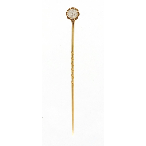 657 - Unmarked gold diamond solitaire tie pin, 7cm in length, approximate weight 2.5g