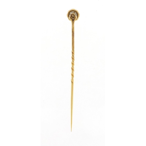 657 - Unmarked gold diamond solitaire tie pin, 7cm in length, approximate weight 2.5g