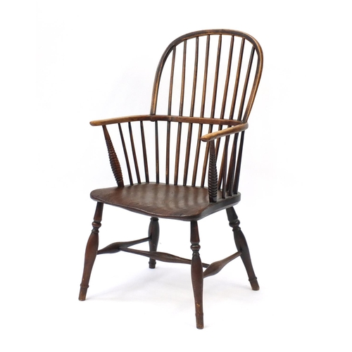 2089 - Antique oak and elm comback chair, the seat stamped JC, 96cm high
