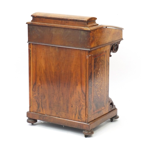 2032 - Victorian inlaid walnut davenport, the lift lid with tooled leather insert above a panel door, side ... 