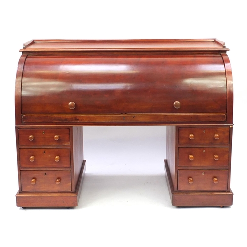 2037 - Mahogany twin pedestal cylinder bureau with fitted interior, pull out writing shelf and six drawers,... 