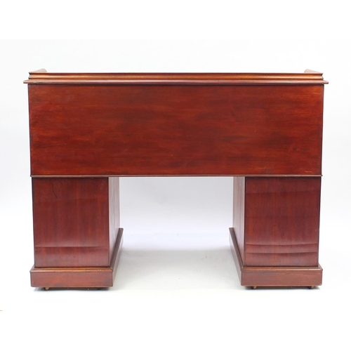 2037 - Mahogany twin pedestal cylinder bureau with fitted interior, pull out writing shelf and six drawers,... 