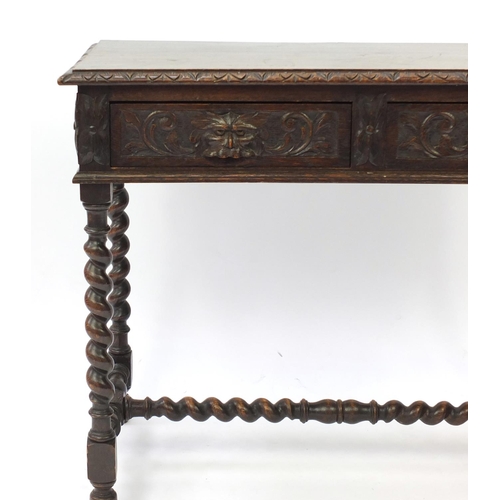2119 - Oak hall table with lion mask carved drawers, barley twist supports and stretcher, 75cm H x 92cm W x... 
