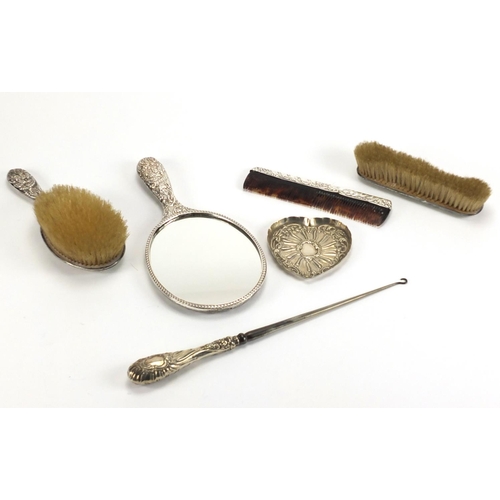 2549 - Six silver vanity items including hand mirror, brushes and heart shaped pin dish, various hallmarks,... 