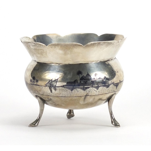 2531 - Egyptian unmarked silver niello work three footed bowl, 8cm high x 10.5cm in diameter, approximate w... 