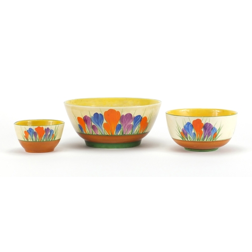 459 - Three Clarice Cliff Bizarre bowls, each hand painted in the Crocus pattern, the largest 16.5cm in di... 