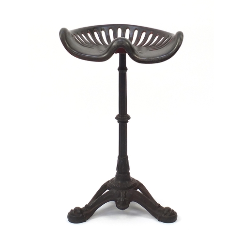 2064 - Decorative tractor seat bar stool with cast iron base, 73cm high