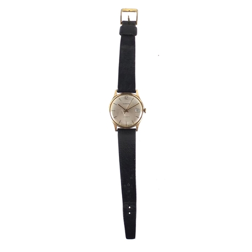 675 - Gentleman's 9ct gold Garrard automatic wristwatch with date dial, 3.3cm in diameter