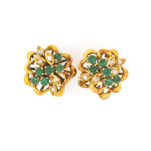 610 - *Description amended 10-07-19* Pair of unmarked gold emerald and diamond flower head earrings, the b... 