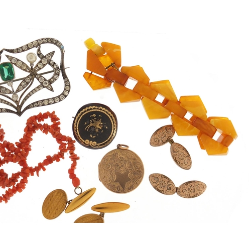 661 - Antique and  later jewellery including a Bakelite amber bracelet, piqué work brooch, large unmarked ... 