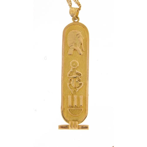 2644 - Egyptian gold ingot pendant (4.2g) on an 18ct gold rope twist necklace (2.9g) the pendant 4.6cm in l... 